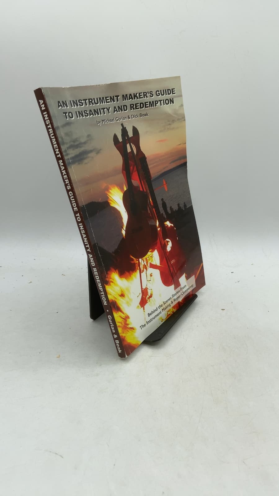 An Instrument Maker's Guide to Insanity and Redemption: Behind the Scenes Stories From The Instrument Making & Repair Community by Michael Gurian & Dick Boak - front cover