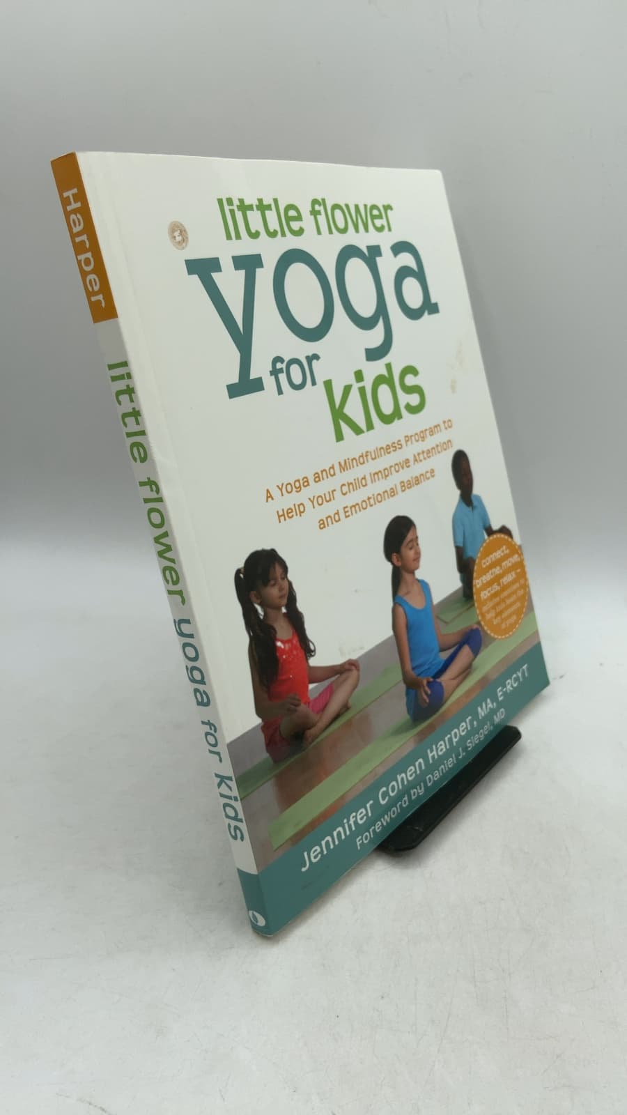 Little Flower Yoga for Kids: A Yoga and Mindfulness Program to Help Your Child Improve Attention and Emotional Balance by Jennifer Cohen Harper - front cover