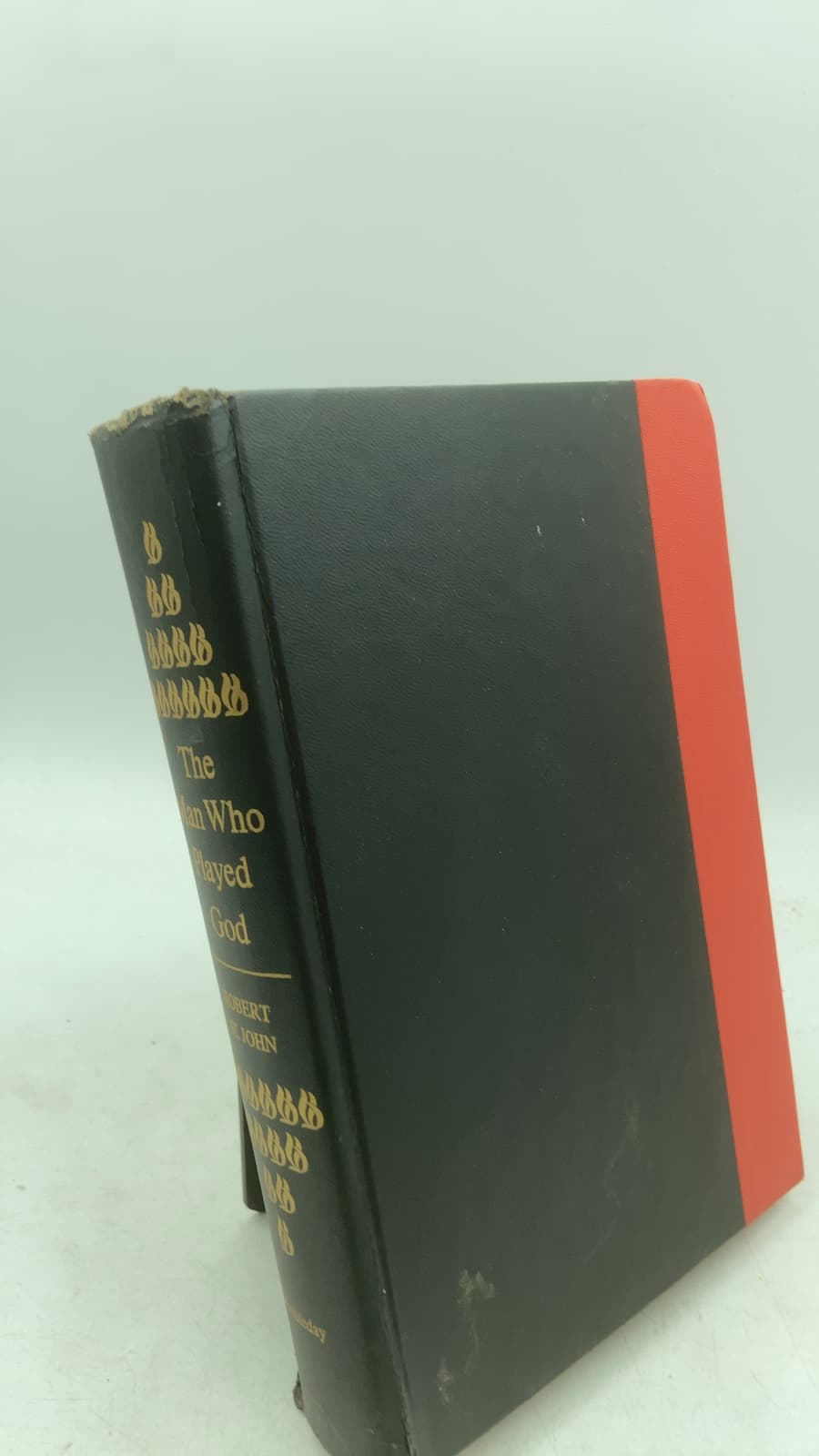 The Man Who Played God by Robert St. John - front cover
