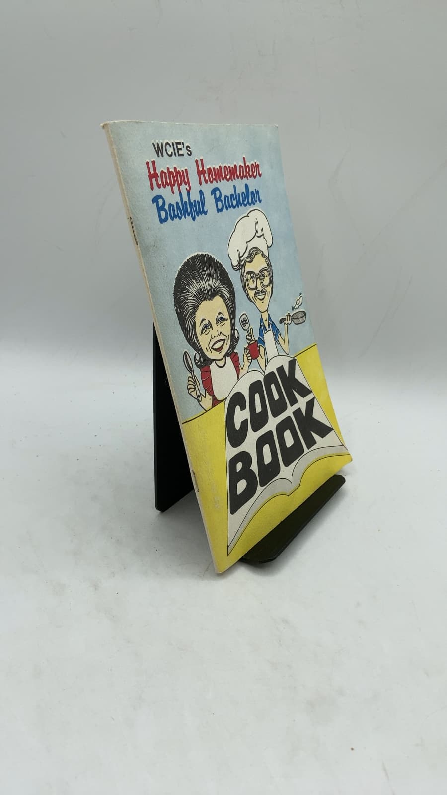 The Happy Homemaker Bashful Bachelor Cookbook by Alice Faye Redd, Stephen Winters, and the Listeners and Staff of WCIE - front cover