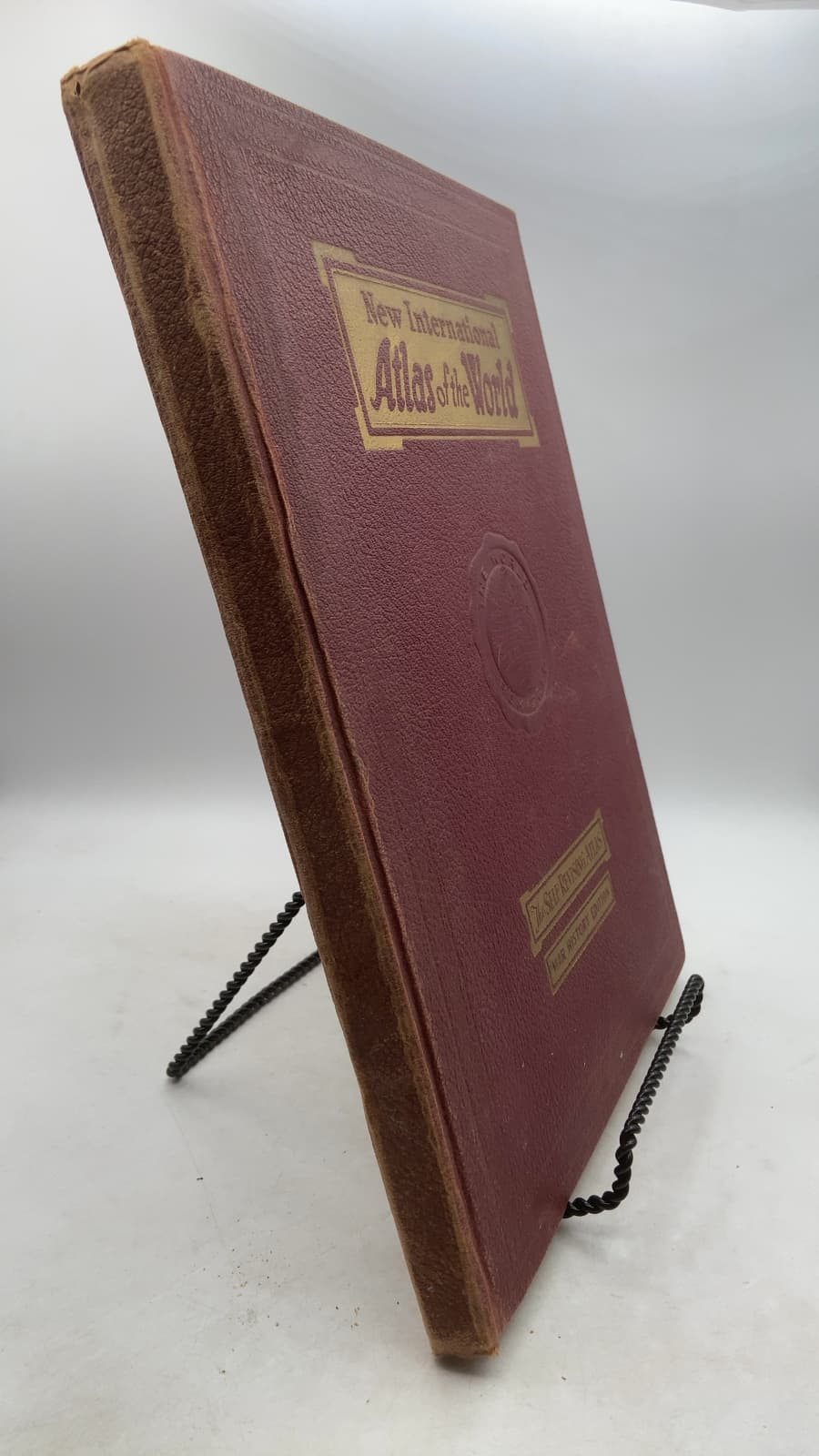 New International Atlas of the World: War History Edition by Frederick K. Branom, Lloyd Edwin Smith, Fred James - front cover