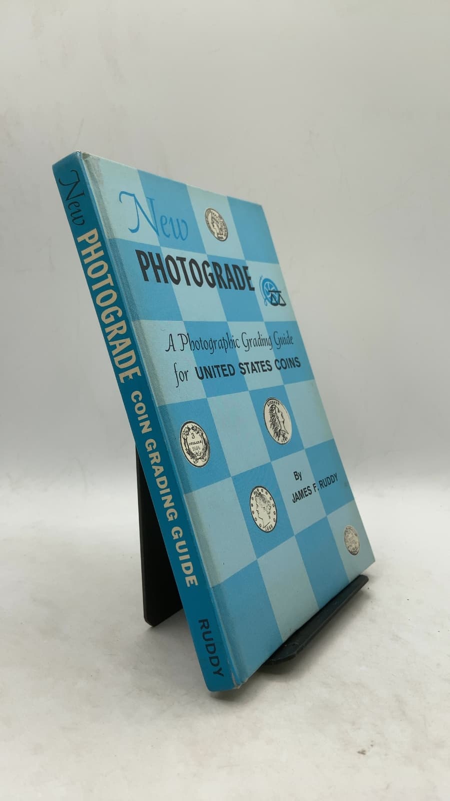 New Photograde: A Photographic Grading Guide for United States Coins by James F. Ruddy - front cover