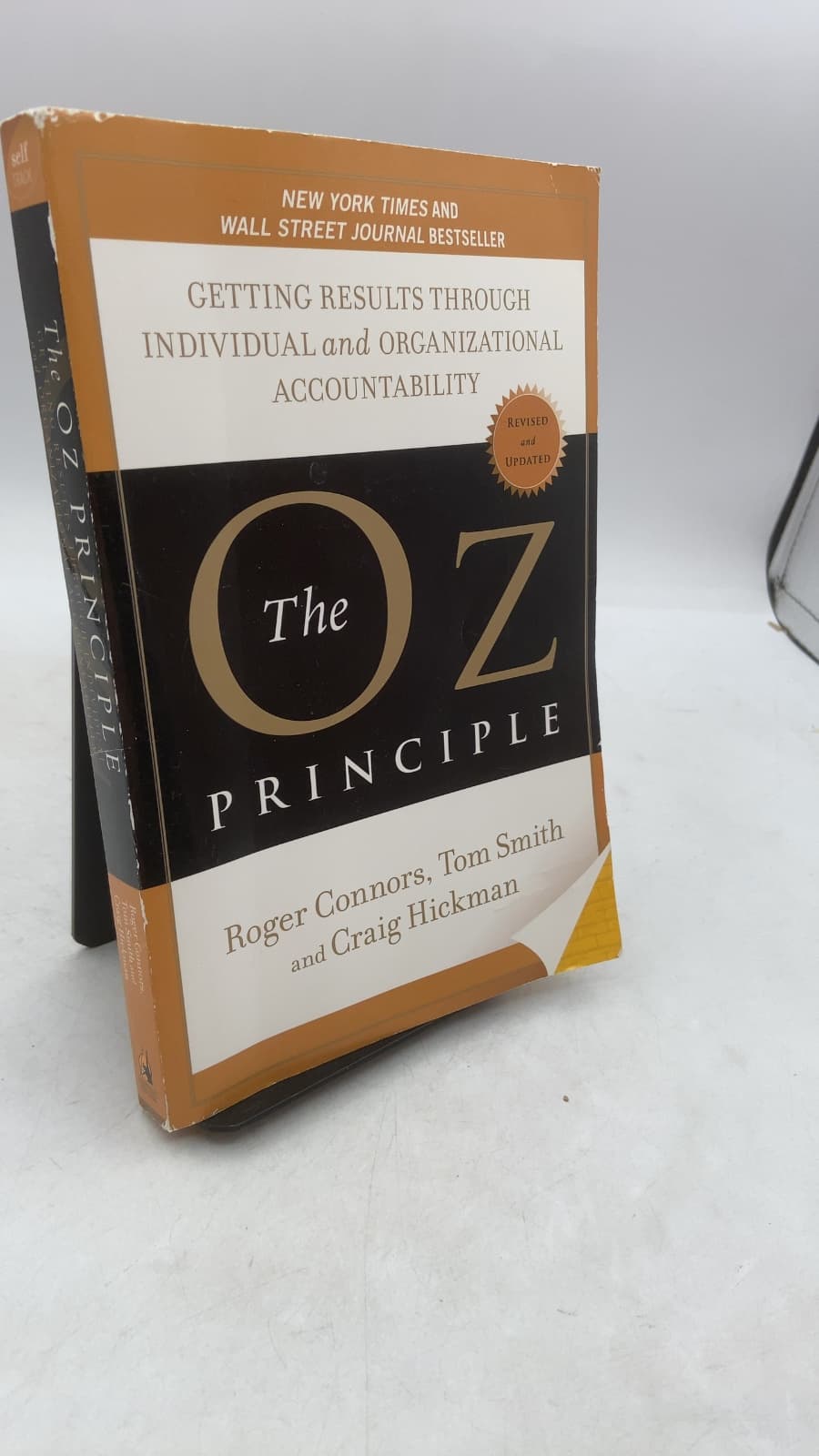 The Oz Principle: Getting Results Through Individual and Organizational Accountability by Roger Connors, Tom Smith, Craig Hickman - front cover