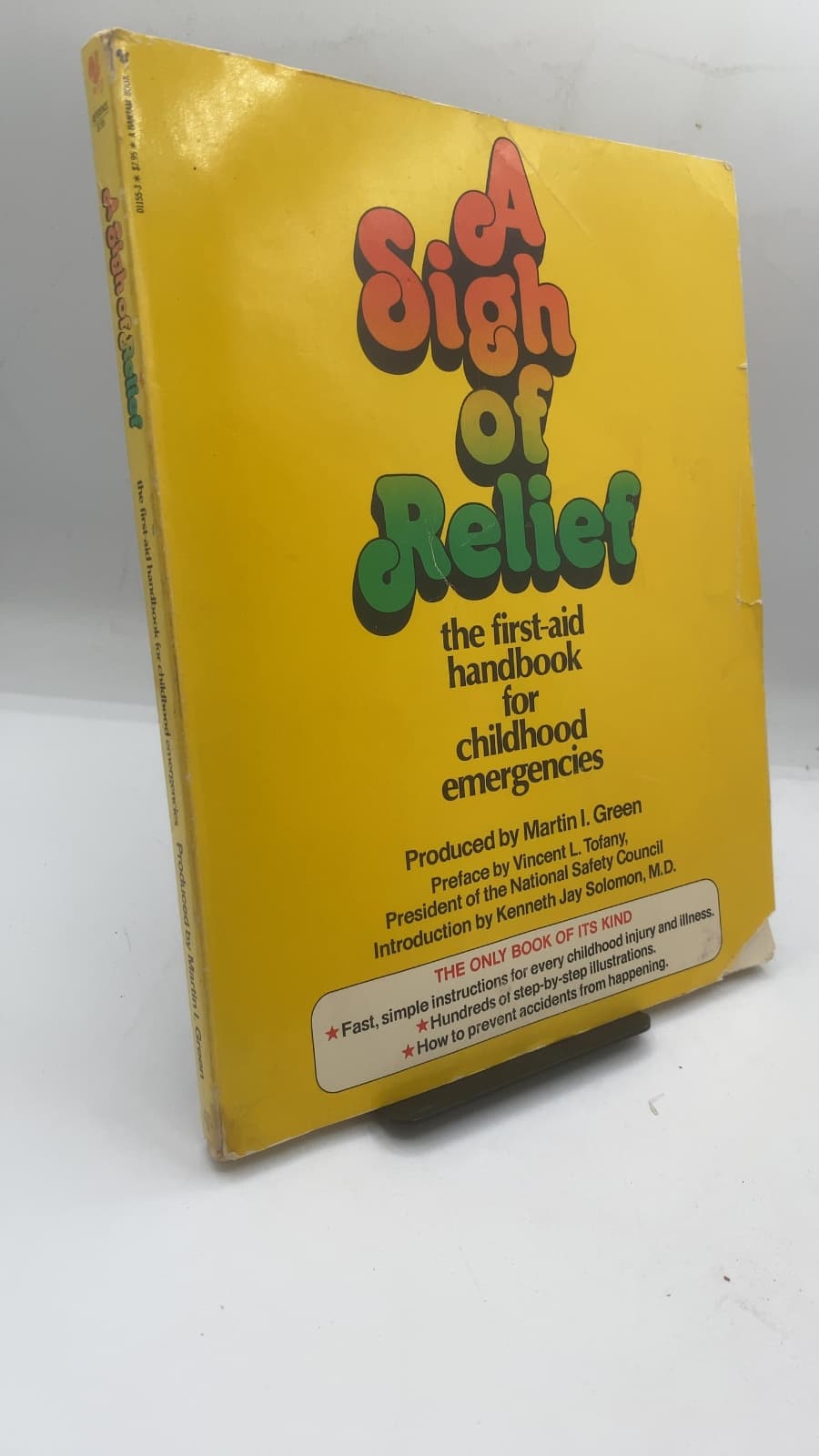 A Sigh of Relief: The First-Aid Handbook for Childhood Emergencies by Martin I. Green - front cover