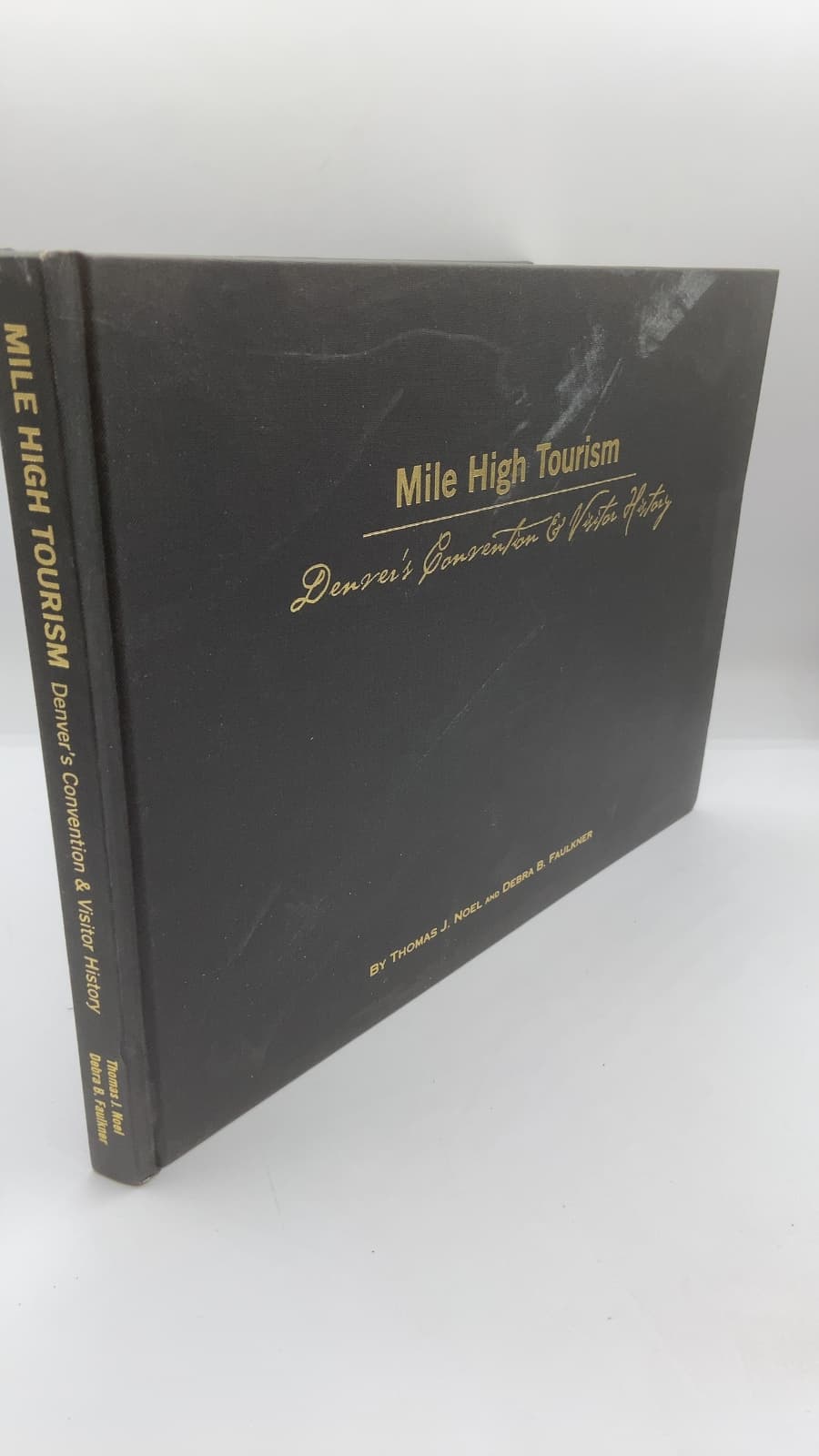 Mile High Tourism: Denver's Convention & Visitor History by Thomas J. Noel and Debra B. Faulkner - front cover