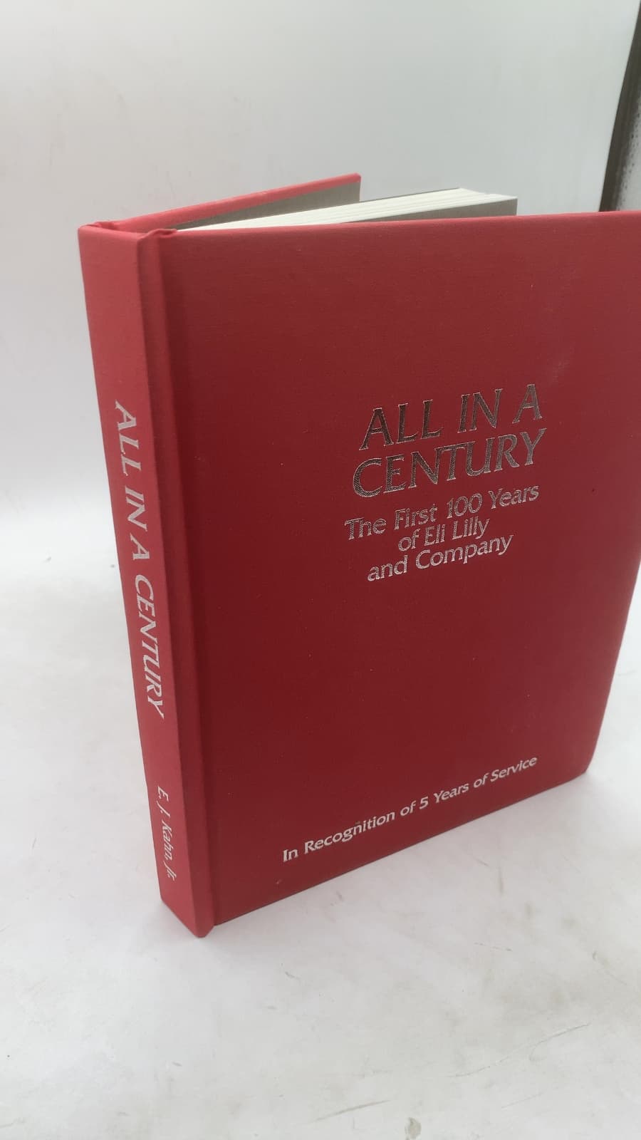 All in a Century: The First 100 Years of Eli Lilly and Company by E.J. Kahn, Jr. - front cover