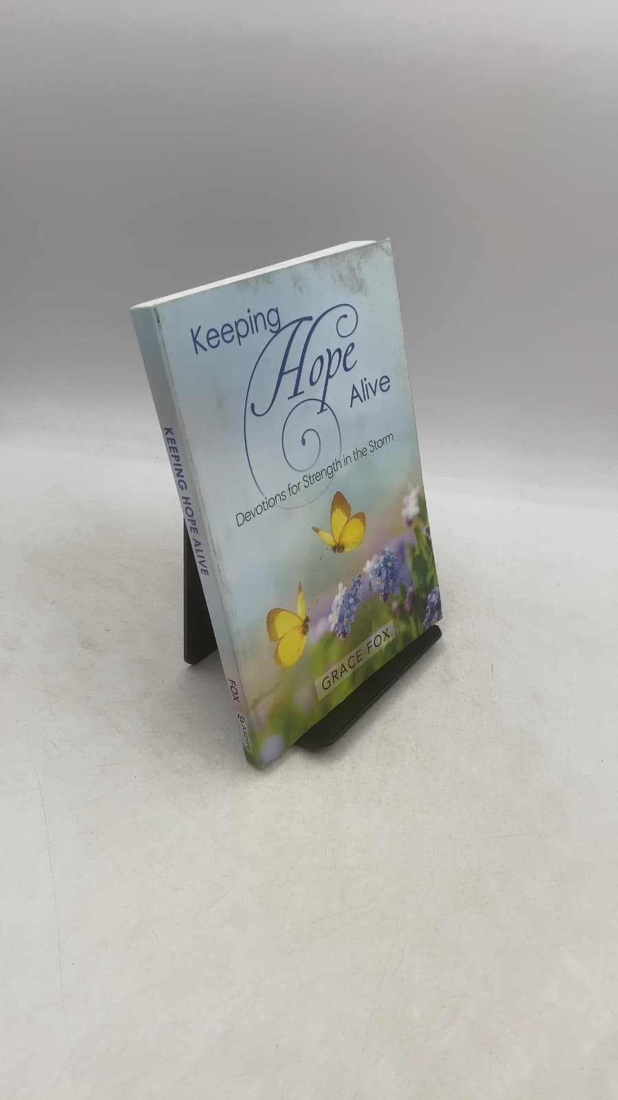 Keeping Hope Alive: Devotions for Strength in the Storm by Grace Fox - front cover