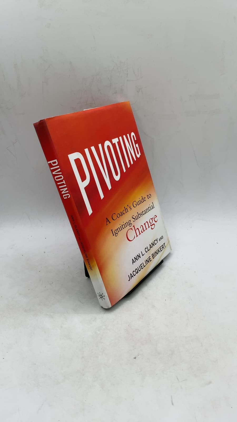 Pivoting: A Coach's Guide to Igniting Substantial Change by Ann L. Clancy and Jacqueline Binkert - front cover