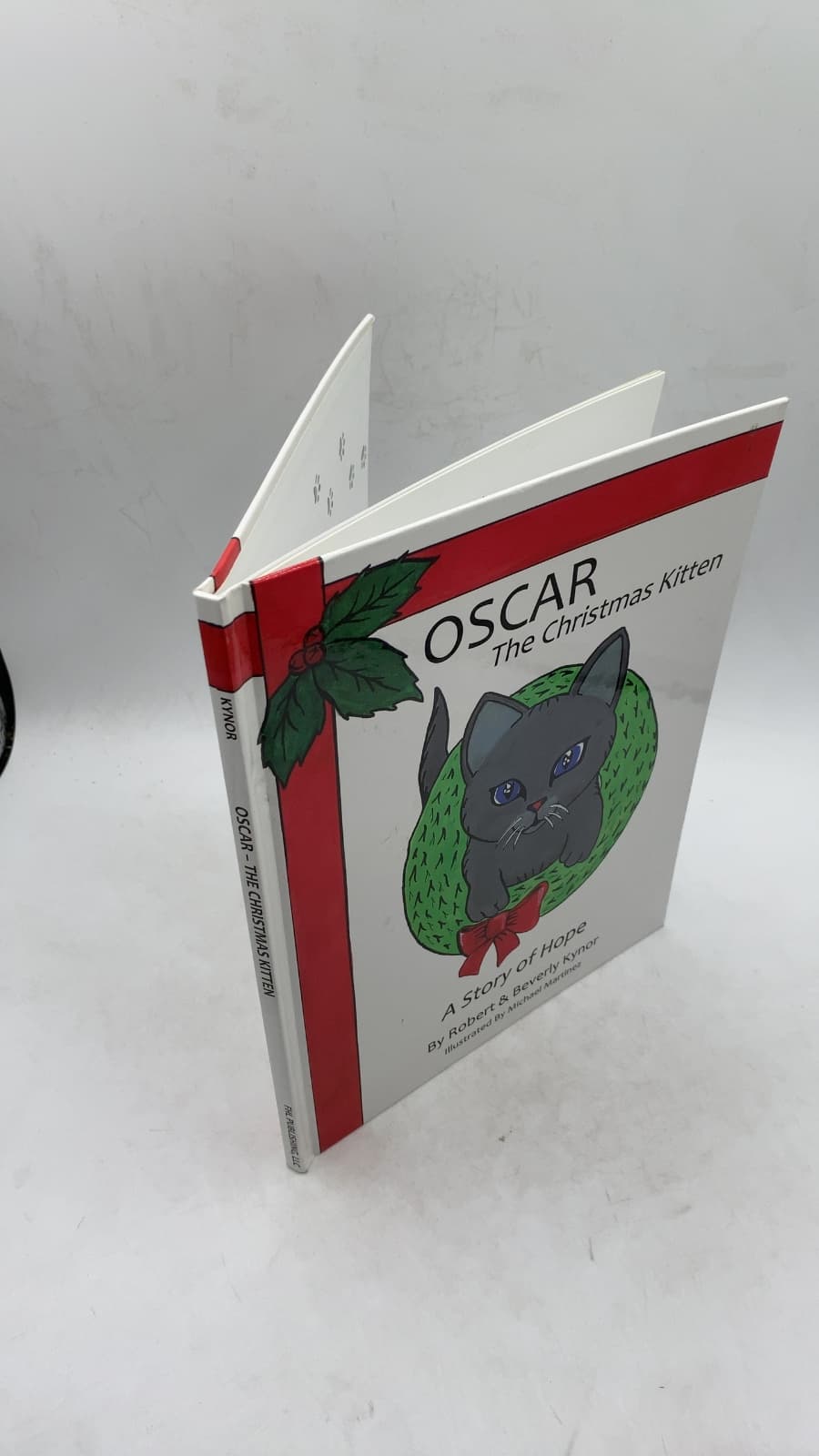 Oscar The Christmas Kitten: A Story of Hope by Robert & Beverly Kynor - front cover