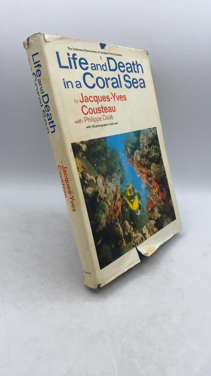 Life and Death in a Coral Sea by Jacques-Yves Cousteau with Philippe Diolé - front cover