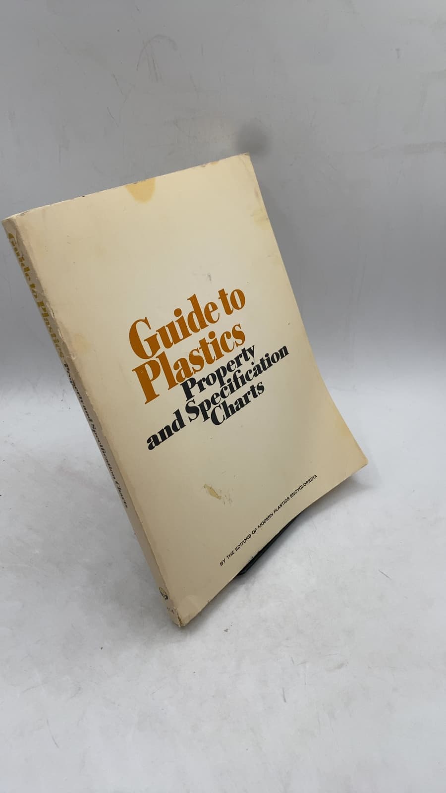 Guide to Plastics Property and Specification Charts by The Editors of Modern Plastics Encyclopedia - front cover