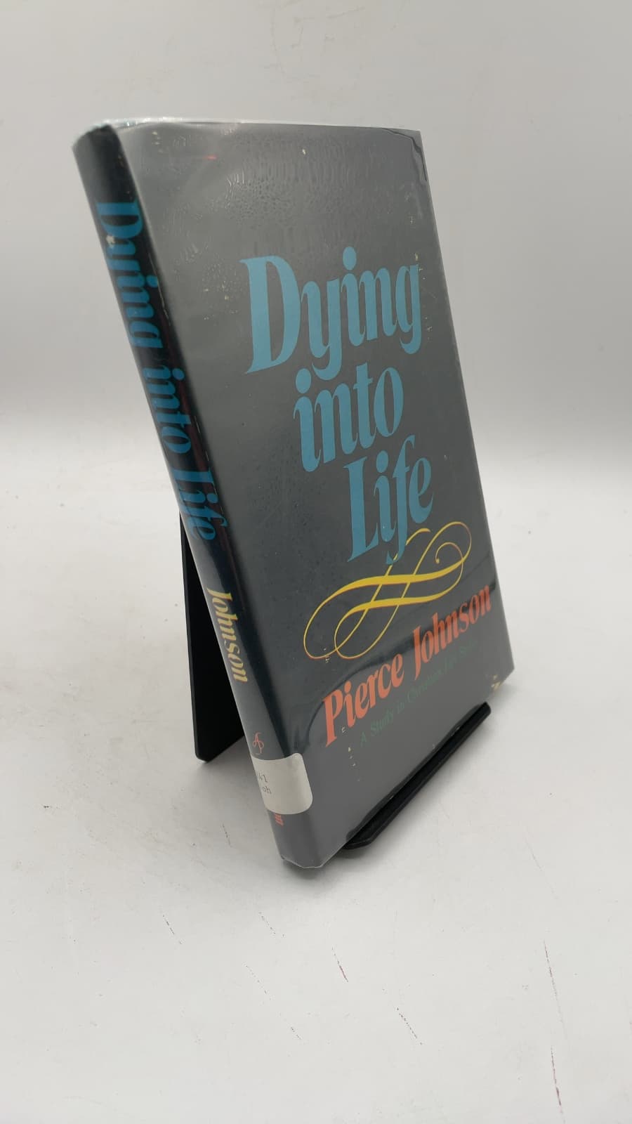 Dying into Life: A Study in Christian Life Styles by Pierce Johnson - front cover