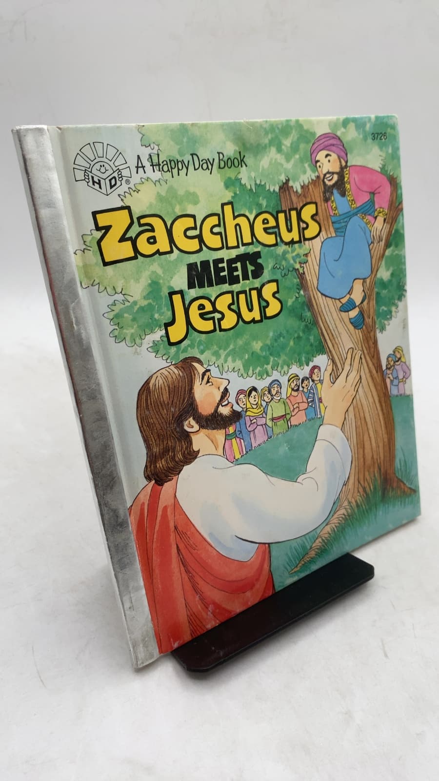 Zaccheus Meets Jesus by Diane M. Stortz - front cover