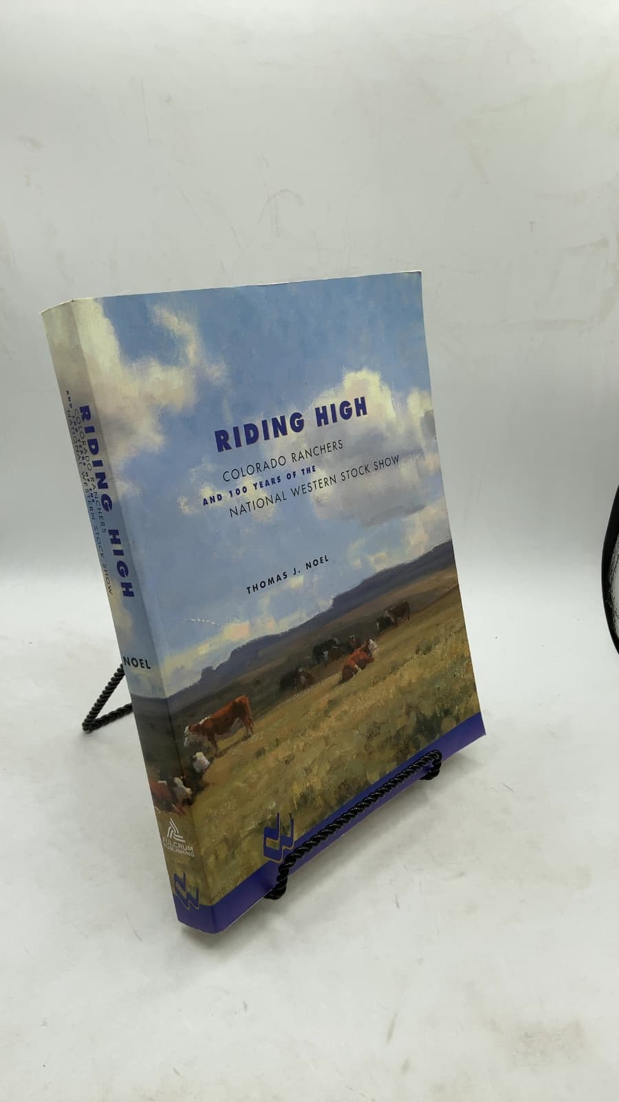 Riding High: Colorado Ranchers and 100 Years of the National Western Stock Show by Thomas J. Noel - front cover