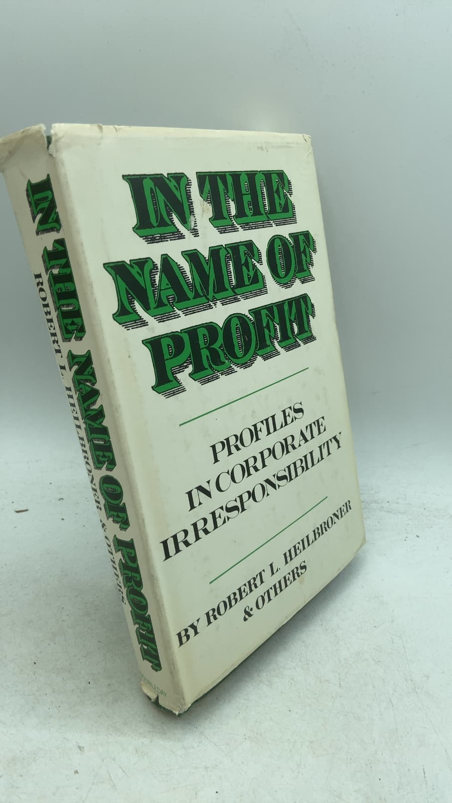 In the Name of Profit: Profiles in Corporate Irresponsibility by Robert L. Heilbroner & Others - front cover