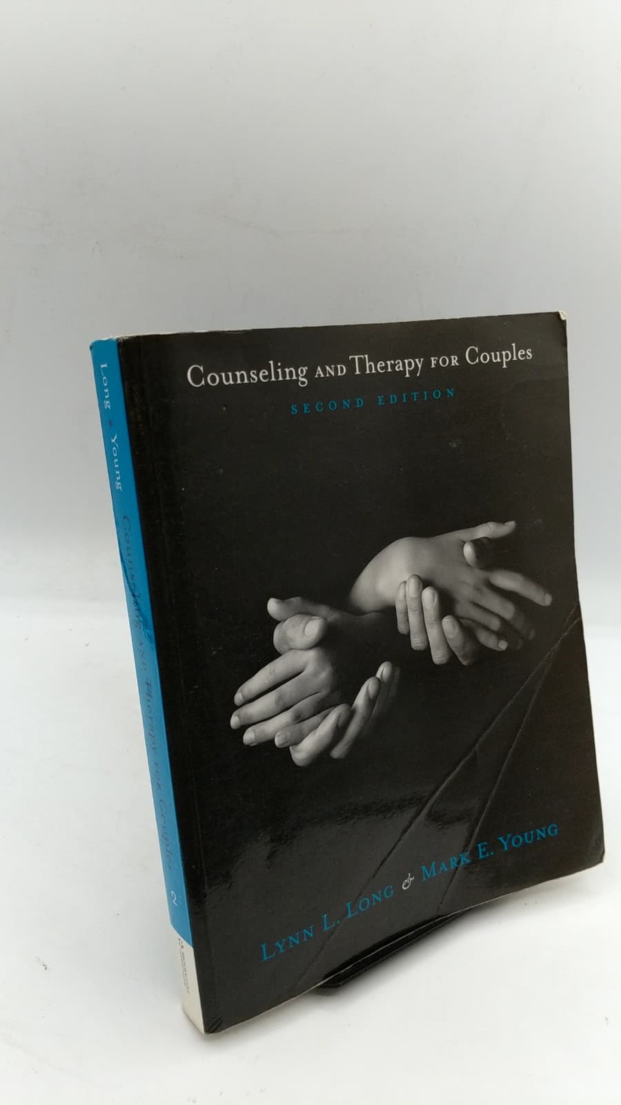 Counseling and Therapy for Couples by Lynn L. Long & Mark E. Young - front cover