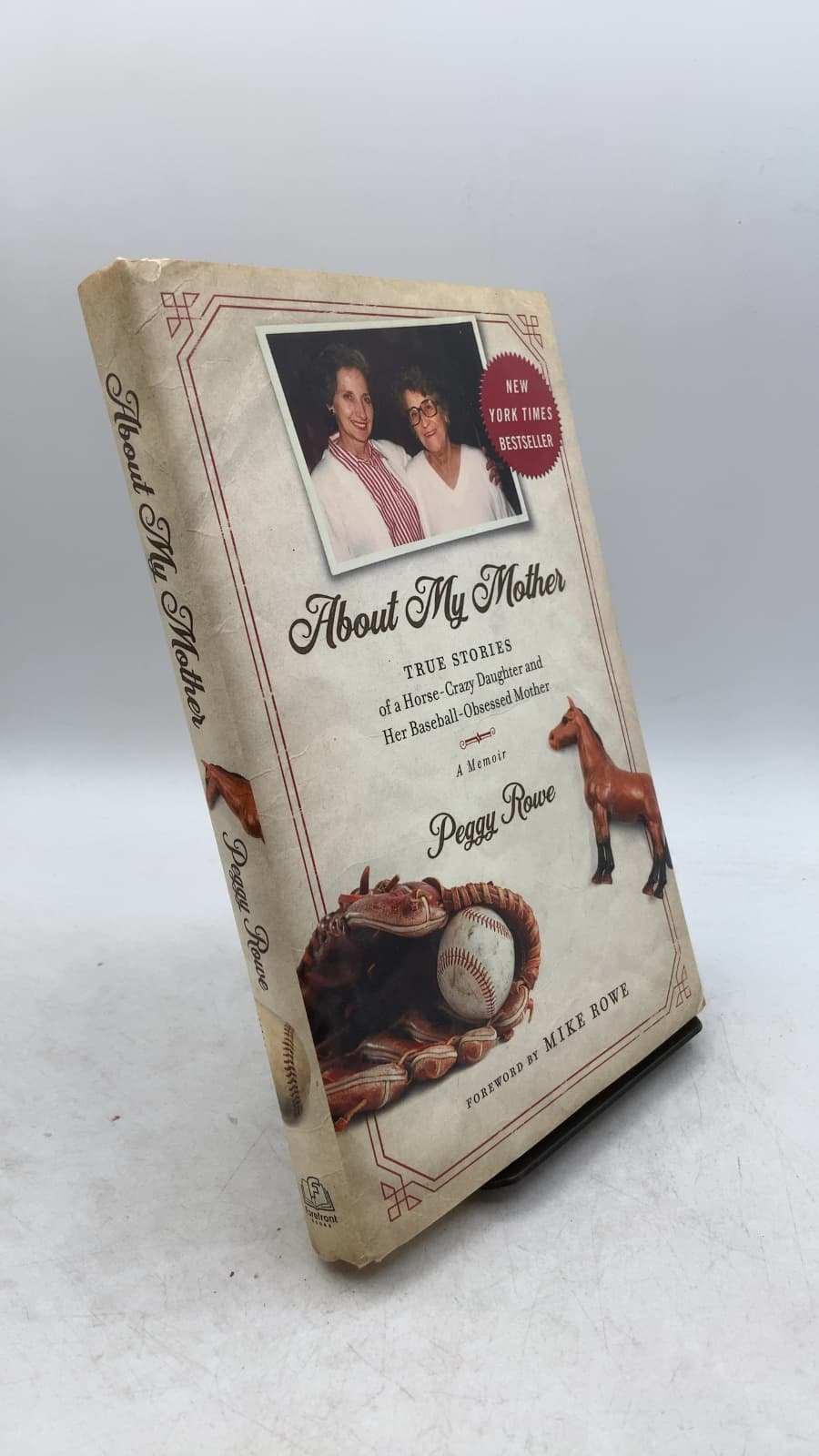 About My Mother: True Stories of a Horse-Crazy Daughter and Her Baseball-Obsessed Mother: A Memoir by Peggy Rowe - front cover