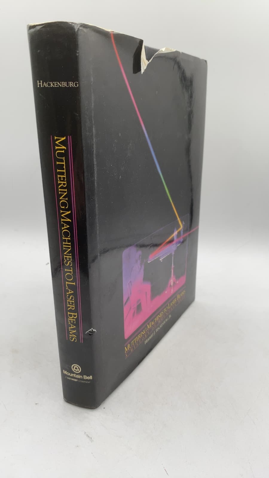 Muttering Machines to Laser Beams: A History of Mountain Bell by Herbert J. Hackenburg, Jr. - front cover
