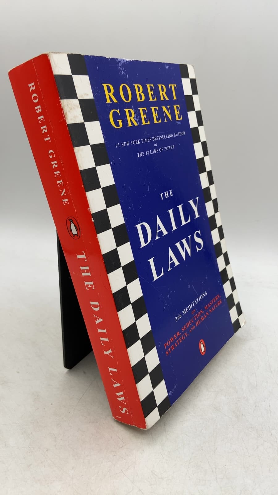 The Daily Laws: 366 Meditations on Power, Seduction, Mastery, Strategy, and Human Nature by Robert Greene - front cover