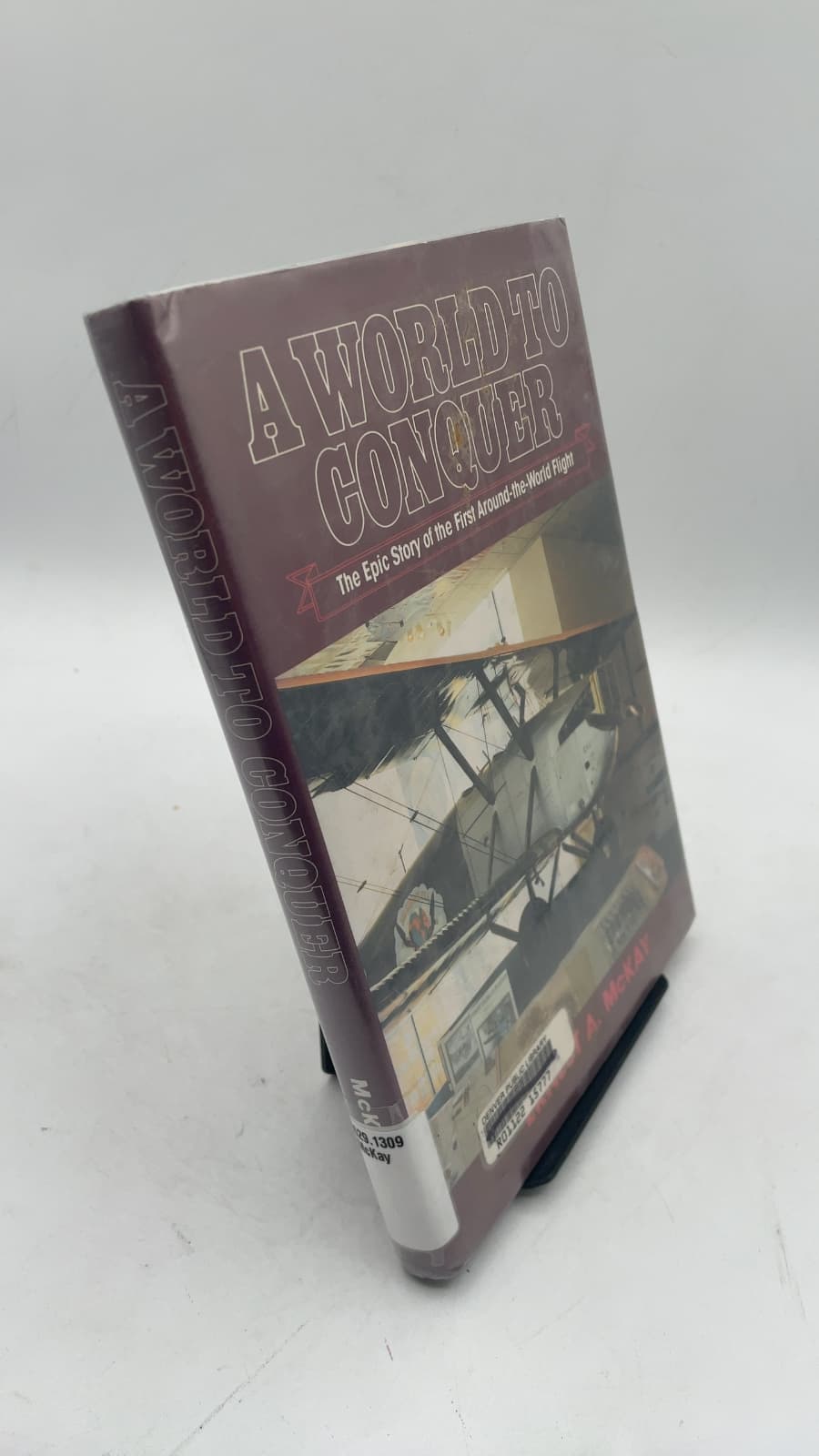 A World to Conquer: The Epic Story of the First Around-the-World Flight by Ernest A. McKay - front cover