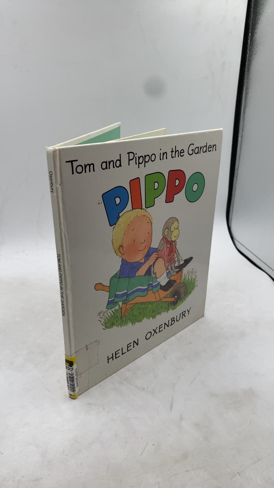 Tom and Pippo in the Garden by Helen Oxenbury - front cover