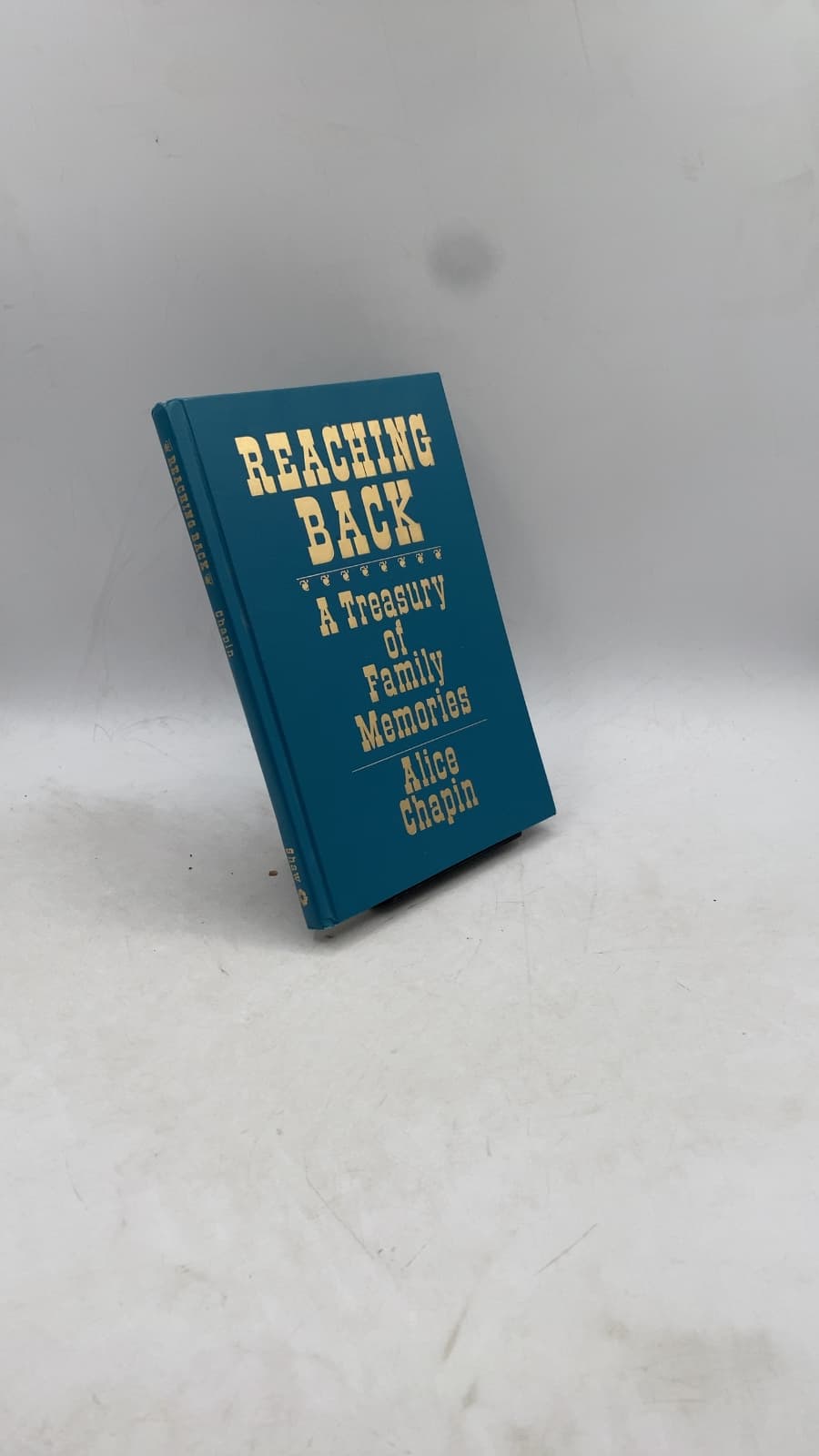 Reaching Back: A Treasury of Family Memories by Alice Chapin - front cover
