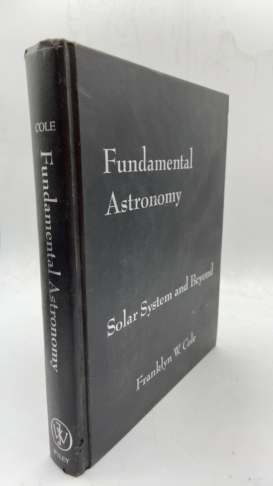 Fundamental Astronomy: Solar System and Beyond by Franklyn W. Cole - front cover
