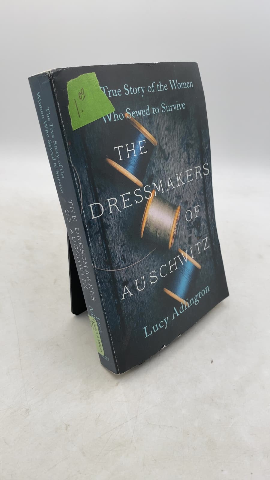 The Dressmakers of Auschwitz: The True Story of the Women Who Sewed to Survive by Lucy Adlington - front cover