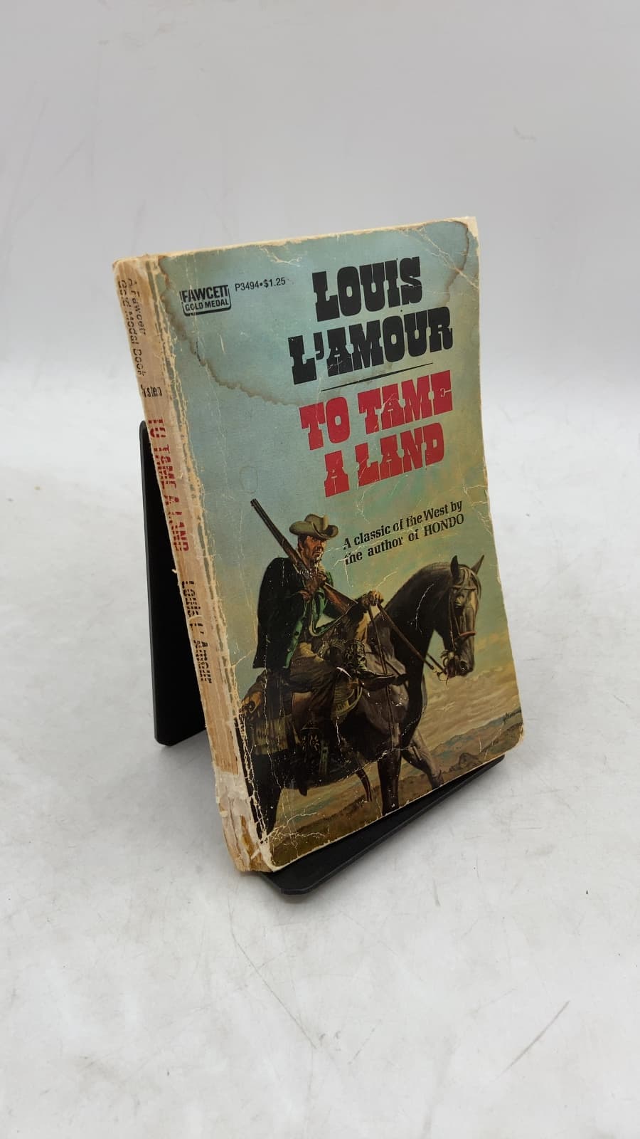 To Tame a Land by Louis L'Amour - front cover