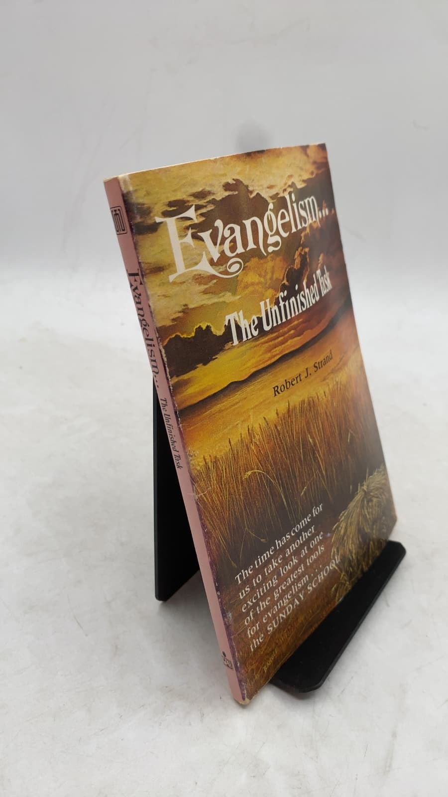 Evangelism... The Unfinished Task by Robert J. Strand - front cover