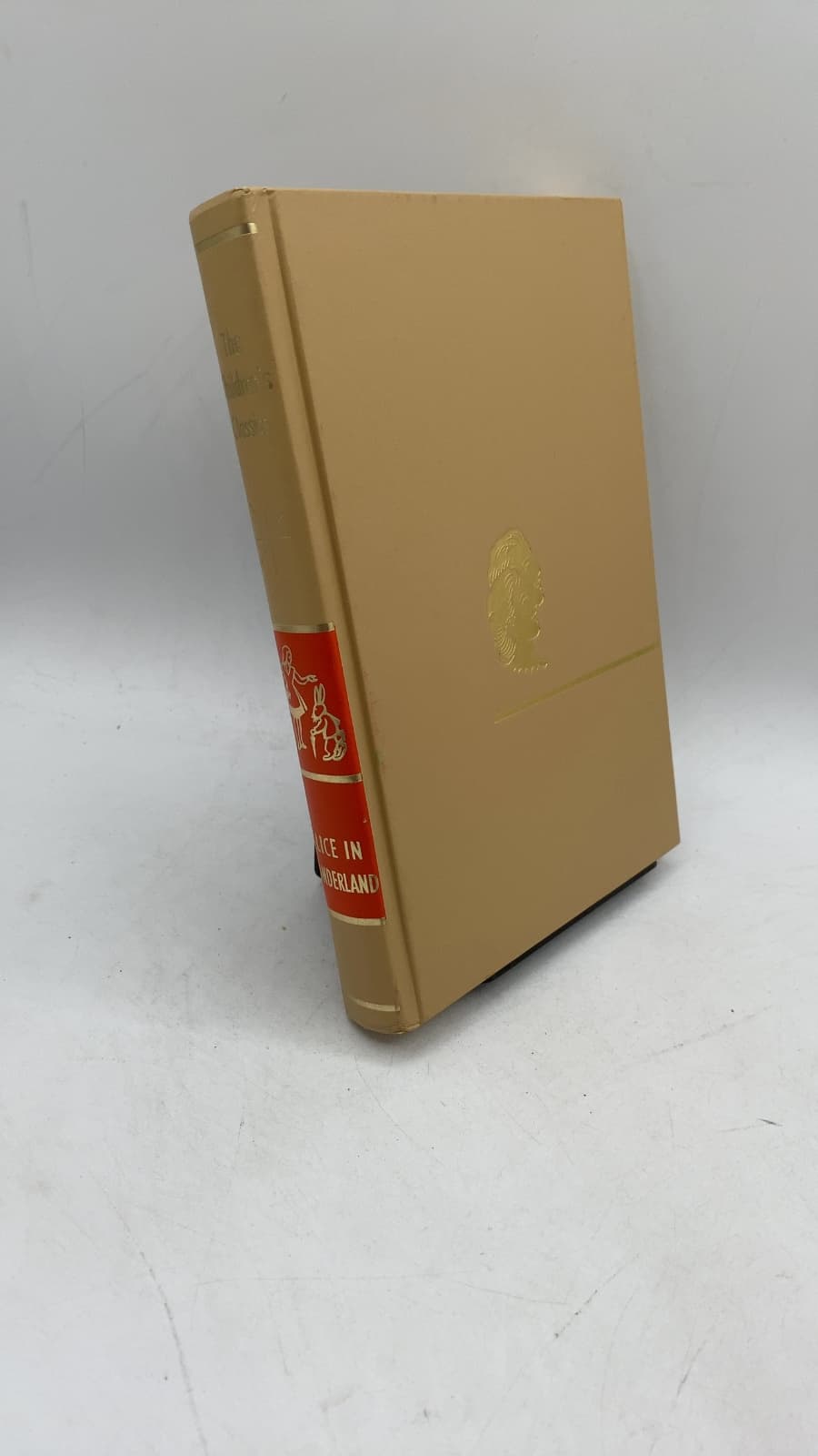 Alice in Wonderland: Comprising the two books, Alice's Adventures in Wonderland and Through the Looking-Glass