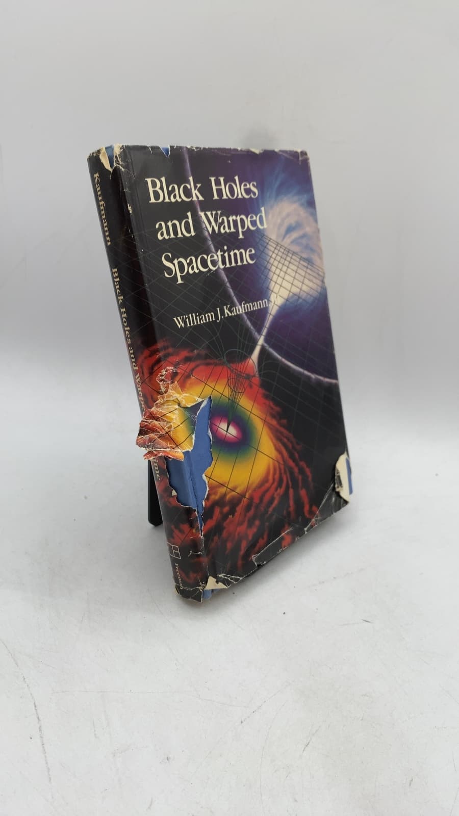 Black Holes and Warped Spacetime