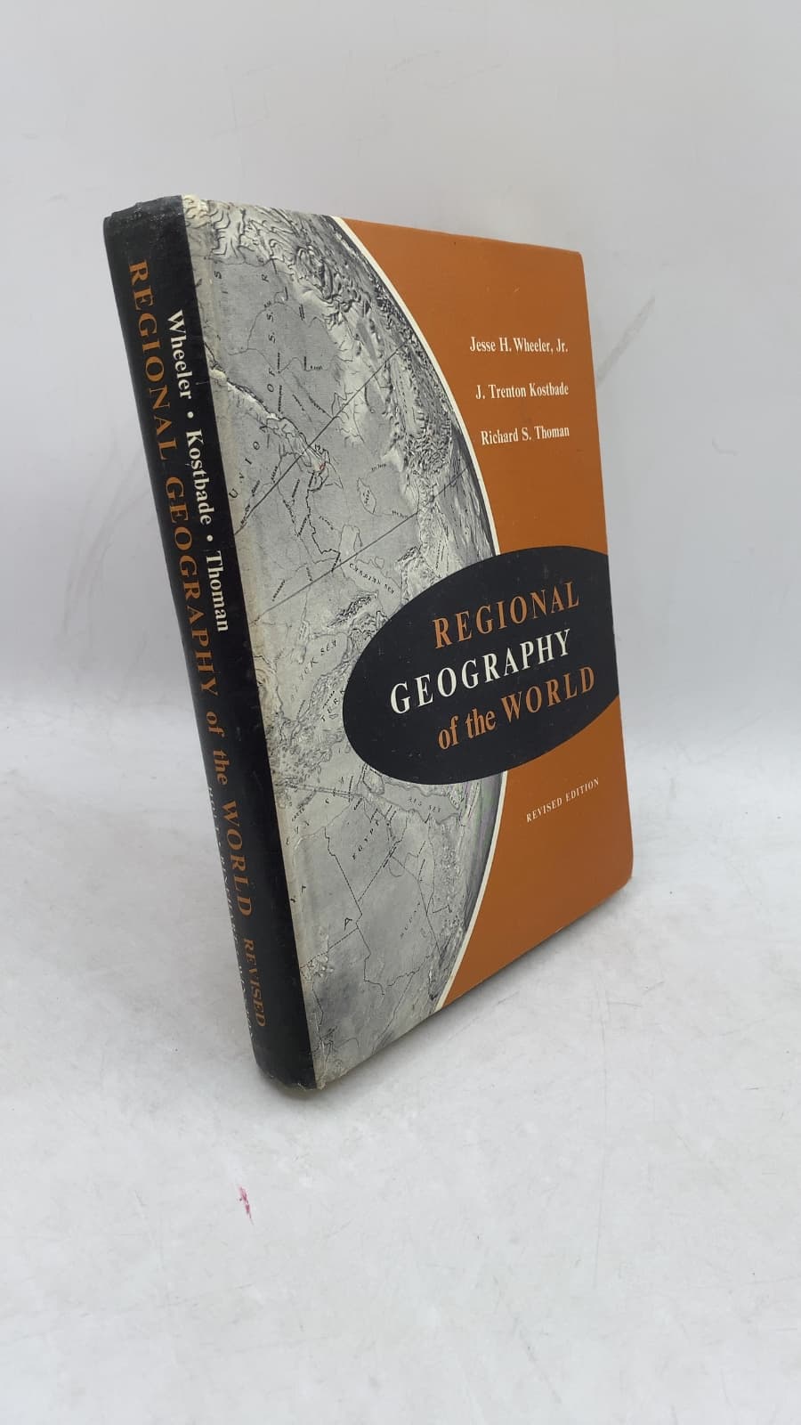 Regional Geography of the World by Jesse H. Wheeler, Jr., J. Trenton Kostbade, Richard S. Thoman - front cover