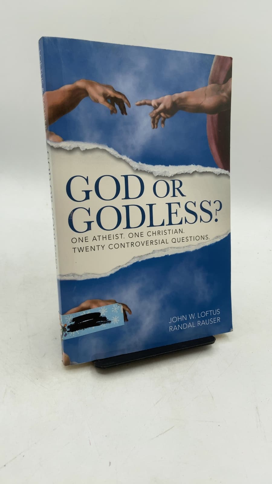God or Godless? One Atheist. One Christian. Twenty Controversial Questions.