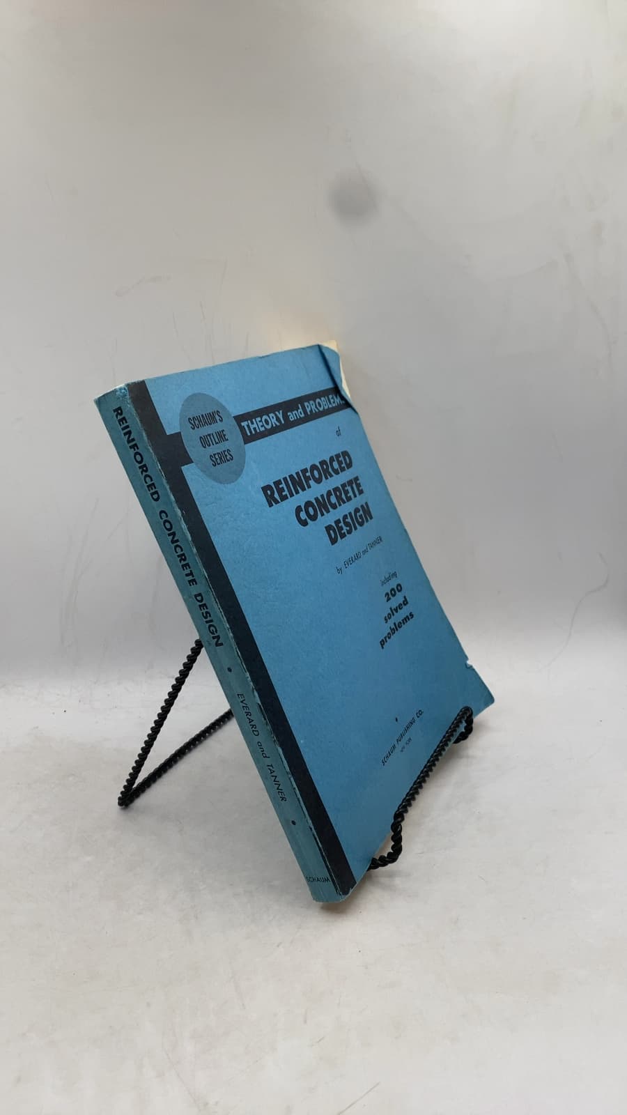 Schaum's Outline of Theory and Problems of Reinforced Concrete Design by Noel J. Everard, MSCE, Ph.D. and John L. Tanner III, MSCE - front cover