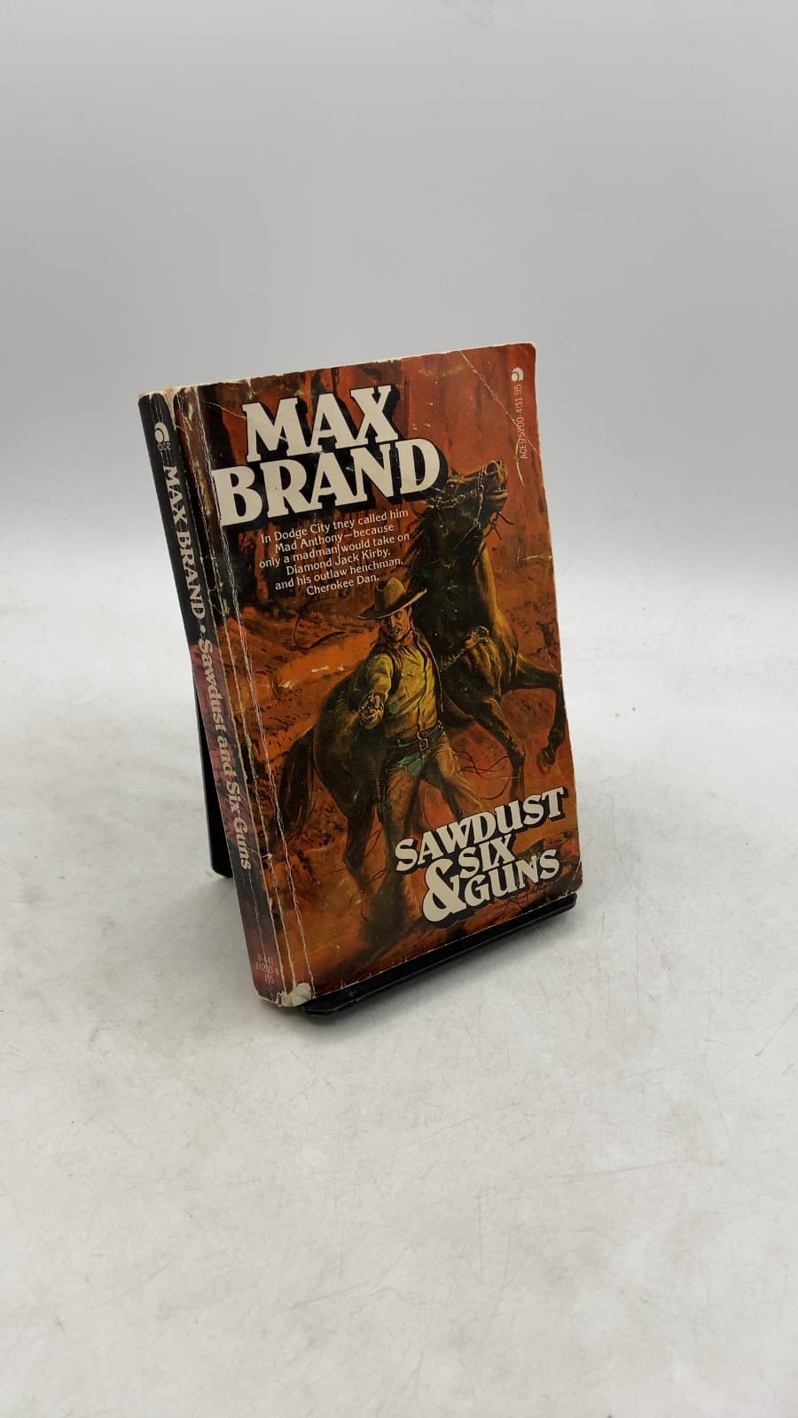 Sawdust and Six Guns by Max Brand - front cover