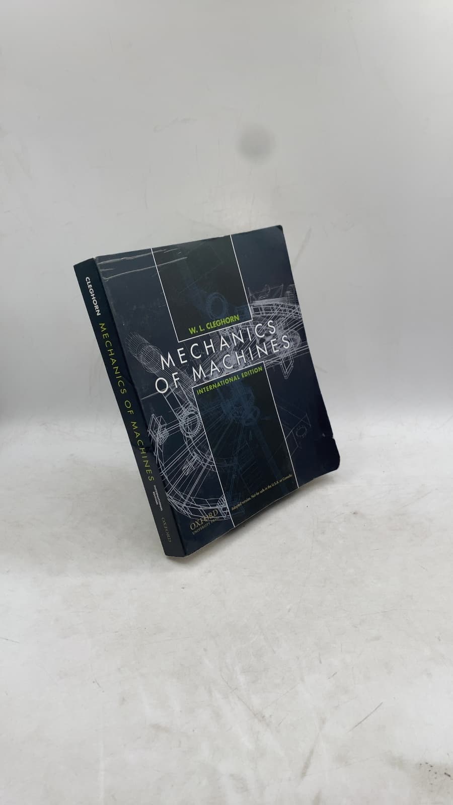 Mechanics of Machines: International Edition by W. L. Cleghorn - front cover