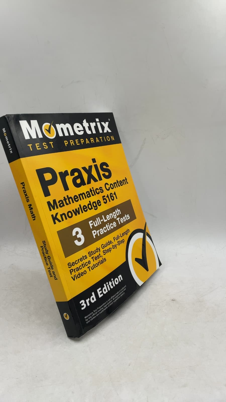 Praxis Mathematics Content Knowledge 5161 Secrets Study Guide by Mometrix Test Preparation - front cover