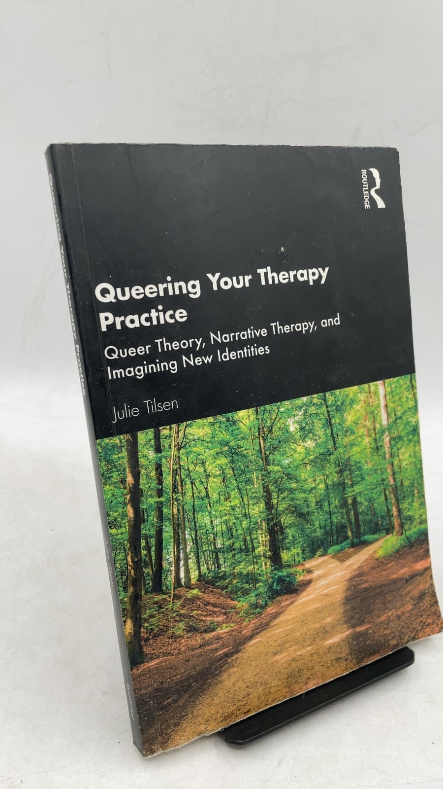 Queering Your Therapy Practice: Queer Theory, Narrative Therapy, and Imagining New Identities by Julie Tilsen - front cover