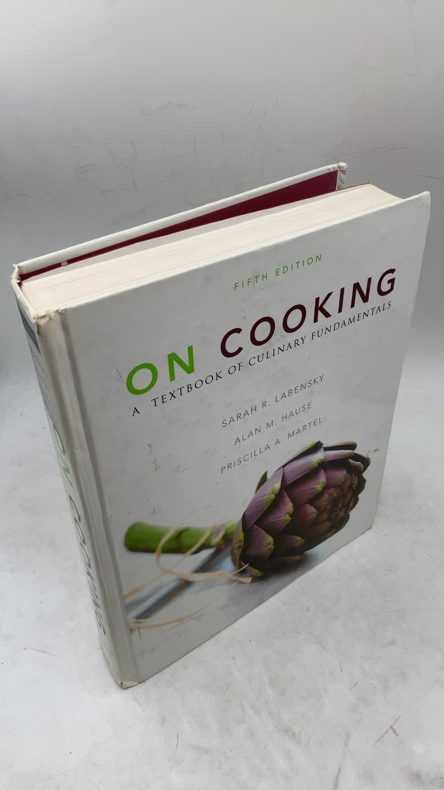 On Cooking: A Textbook of Culinary Fundamentals by Sarah R. Labensky, Alan M. Hause, Priscilla A. Martel - front cover