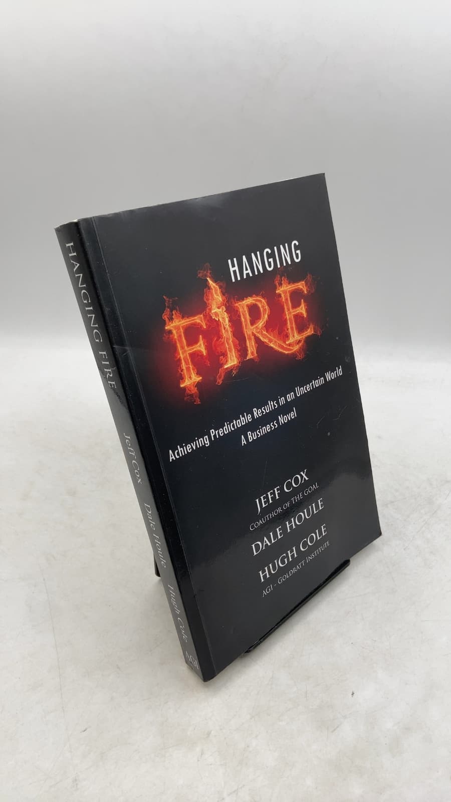 Hanging Fire: Achieving Predictable Results in an Uncertain World by Jeff Cox, Dale Houle, and Hugh Cole - front cover