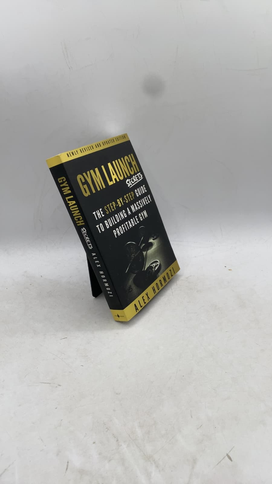 Gym Launch Secrets: The Step-By-Step Guide To Building A Massively Profitable Gym by Alex Hormozi - front cover