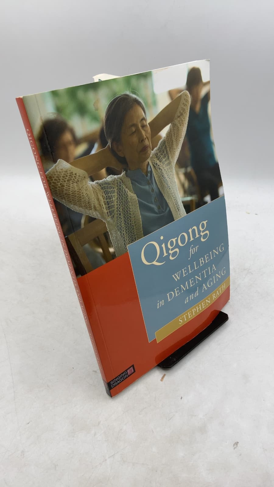 Qigong for Wellbeing in Dementia and Aging by Stephen Rath with Marcia Rath - front cover