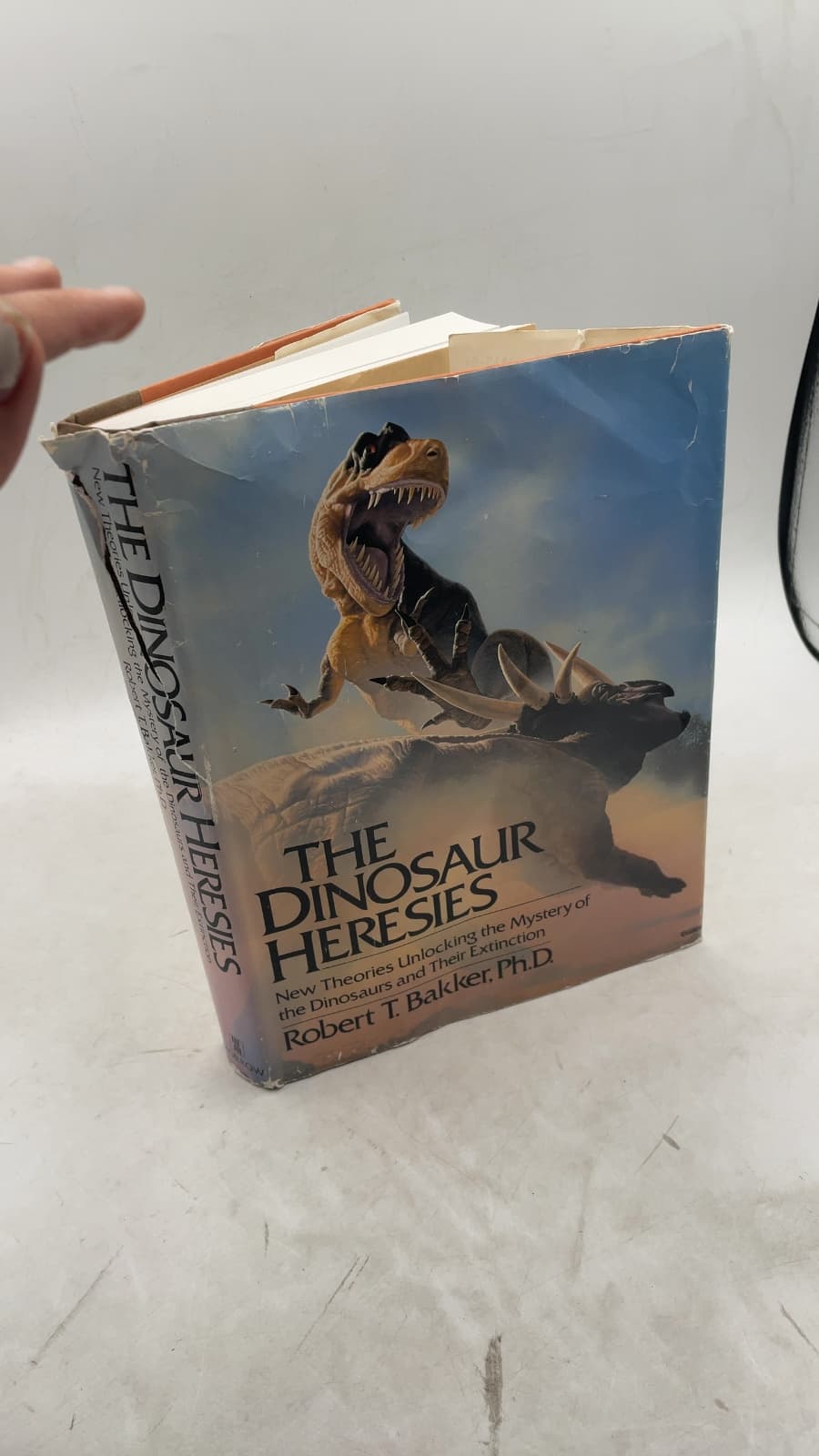 The Dinosaur Heresies: New Theories Unlocking the Mystery of the Dinosaurs and Their Extinction by Robert T. Bakker, Ph.D. - front cover