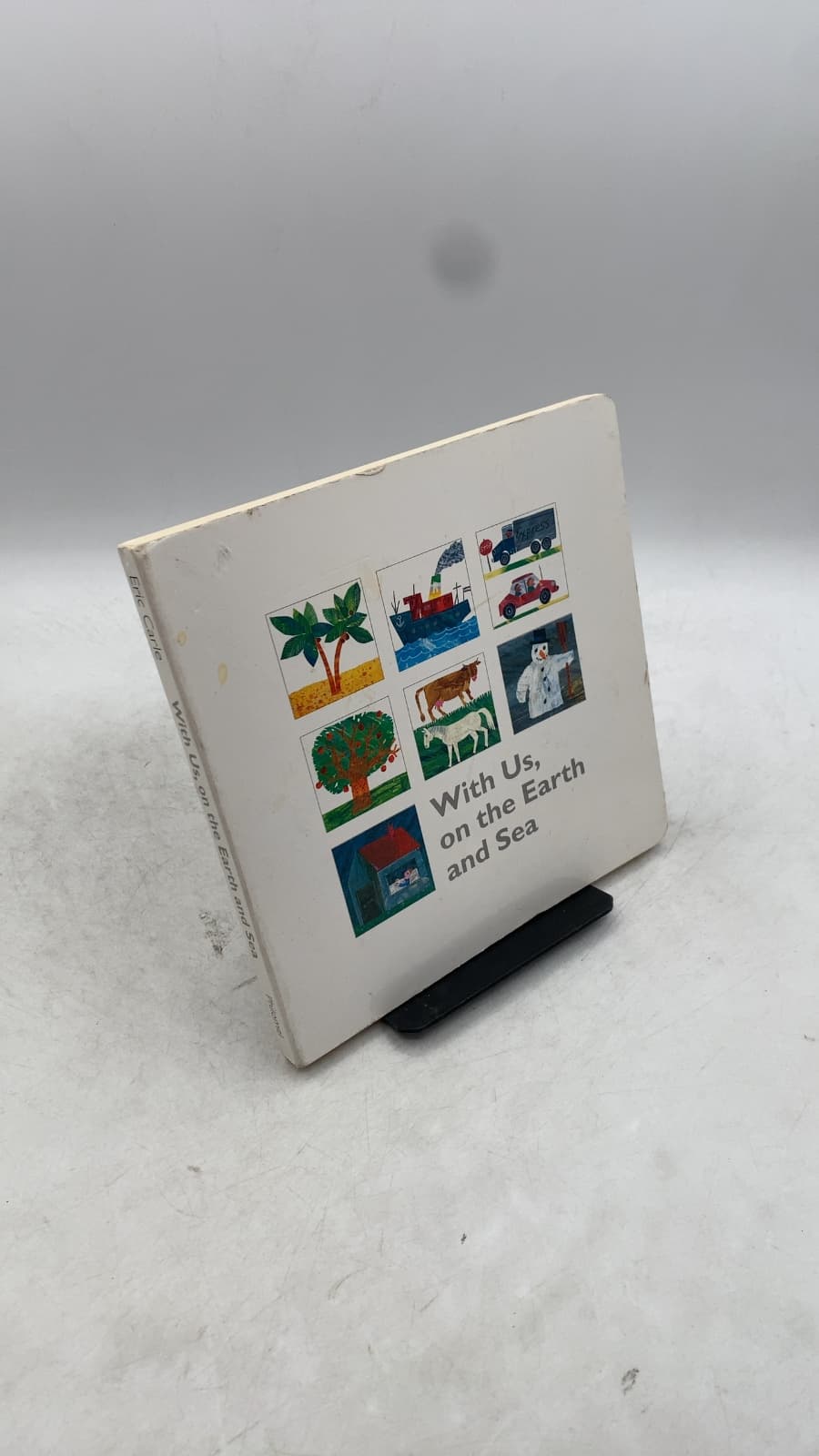 With Us, on the Earth and Sea by Eric Carle - front cover