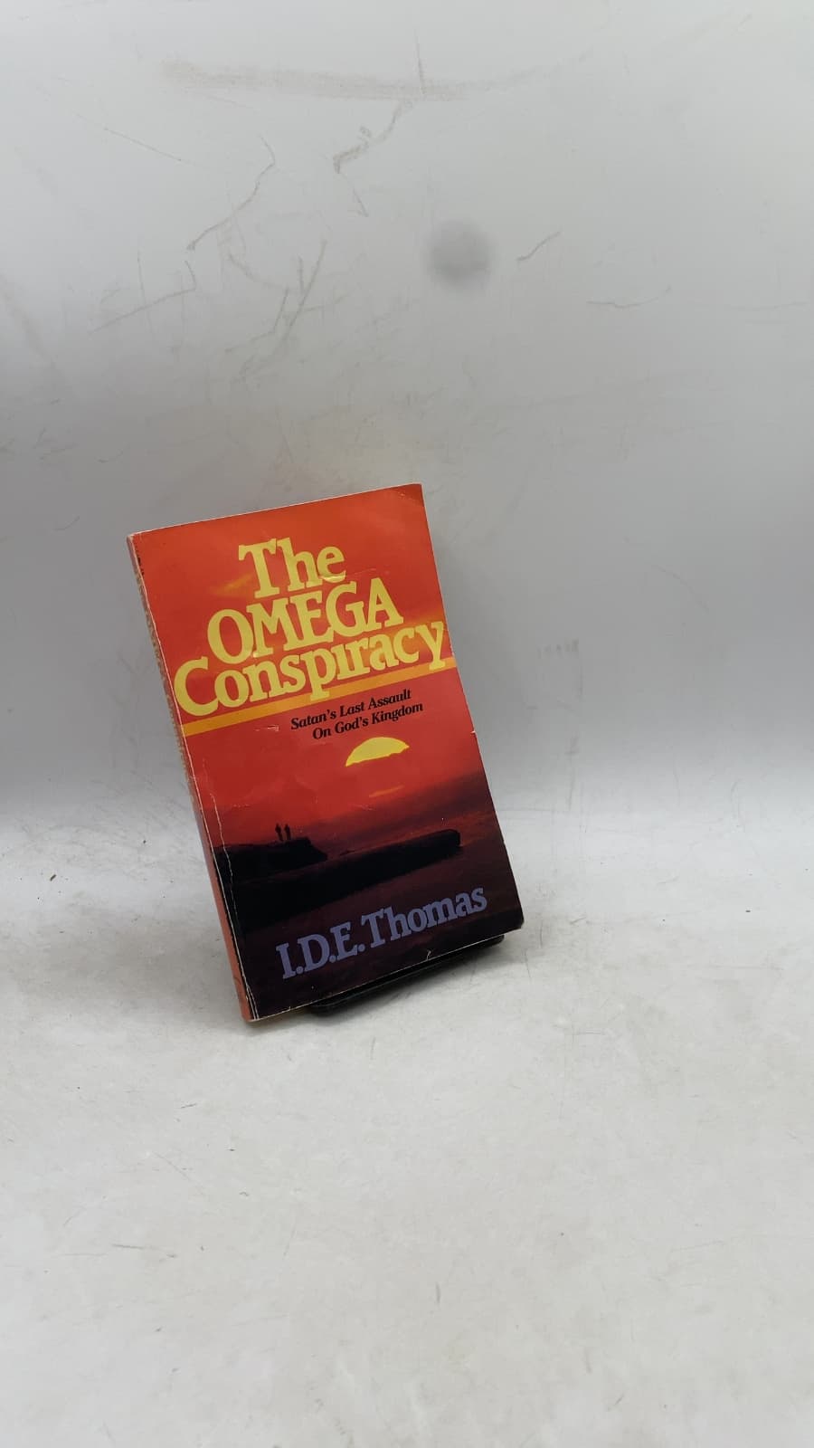 The Omega Conspiracy: Satan's Last Assault on God's Kingdom by I.D.E. Thomas - front cover