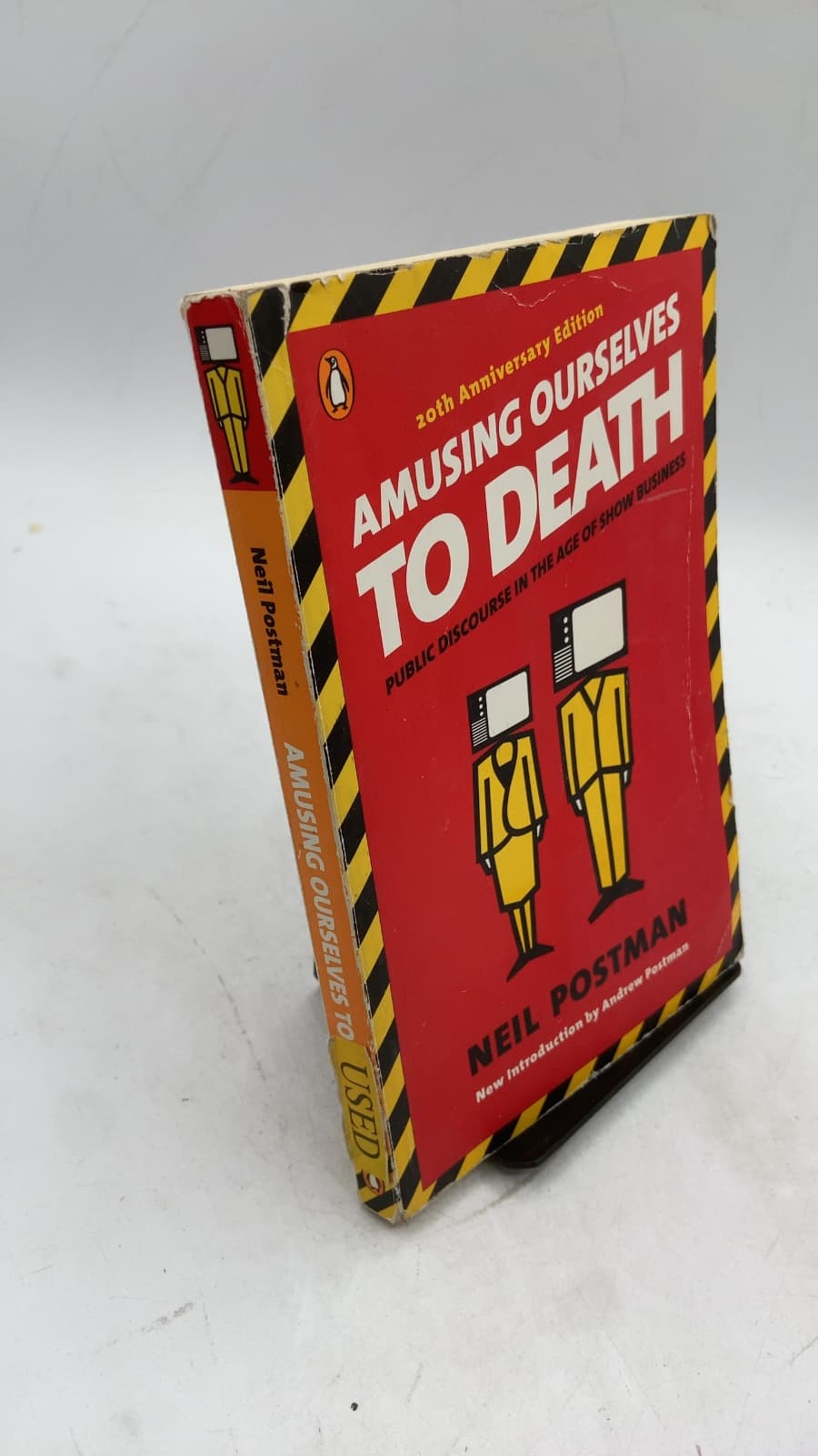 Amusing Ourselves to Death: Public Discourse in the Age of Show Business by Neil Postman - front cover
