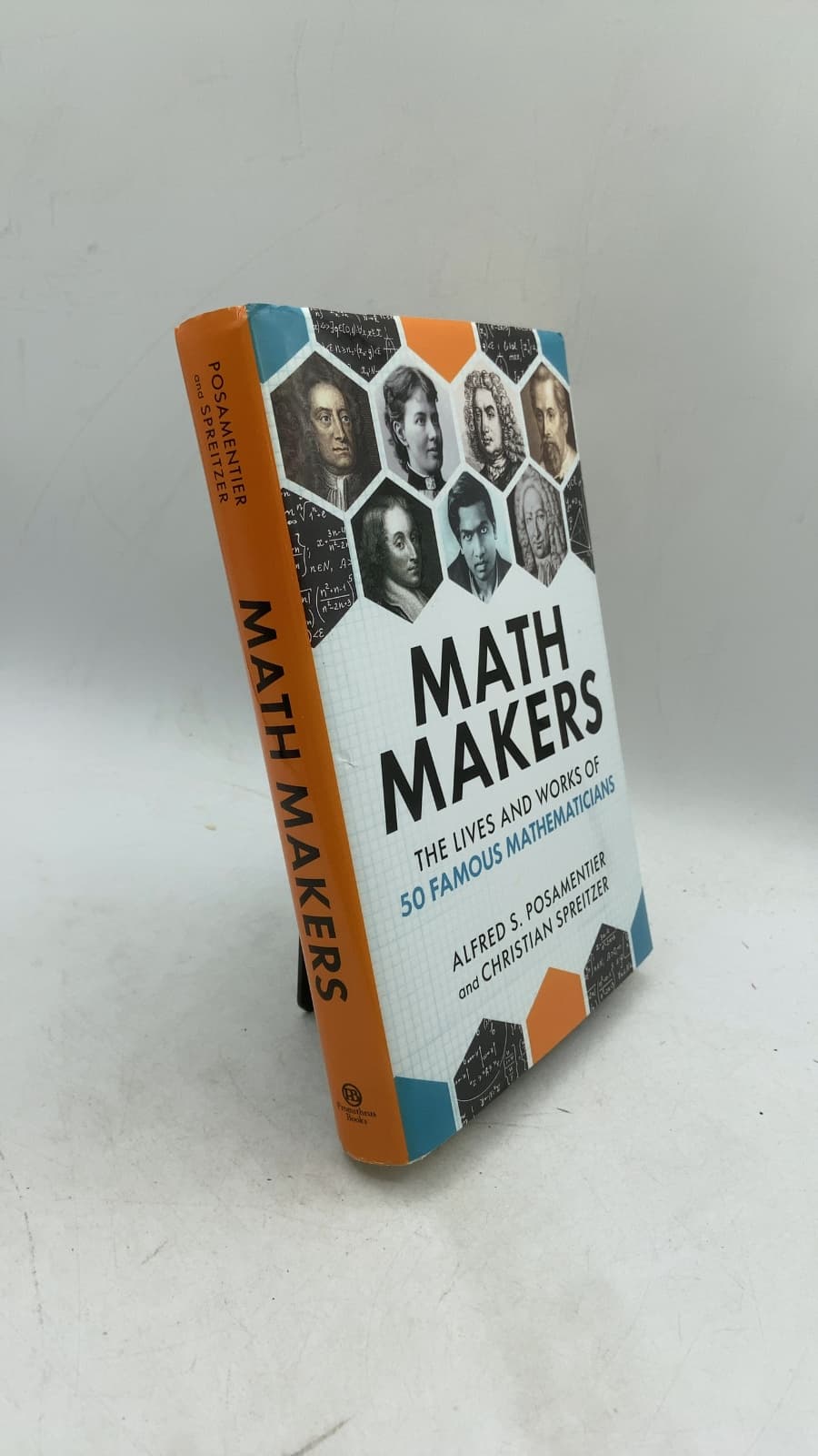 Math Makers: The Lives and Works of 50 Famous Mathematicians by Alfred S. Posamentier and Christian Spreitzer - front cover
