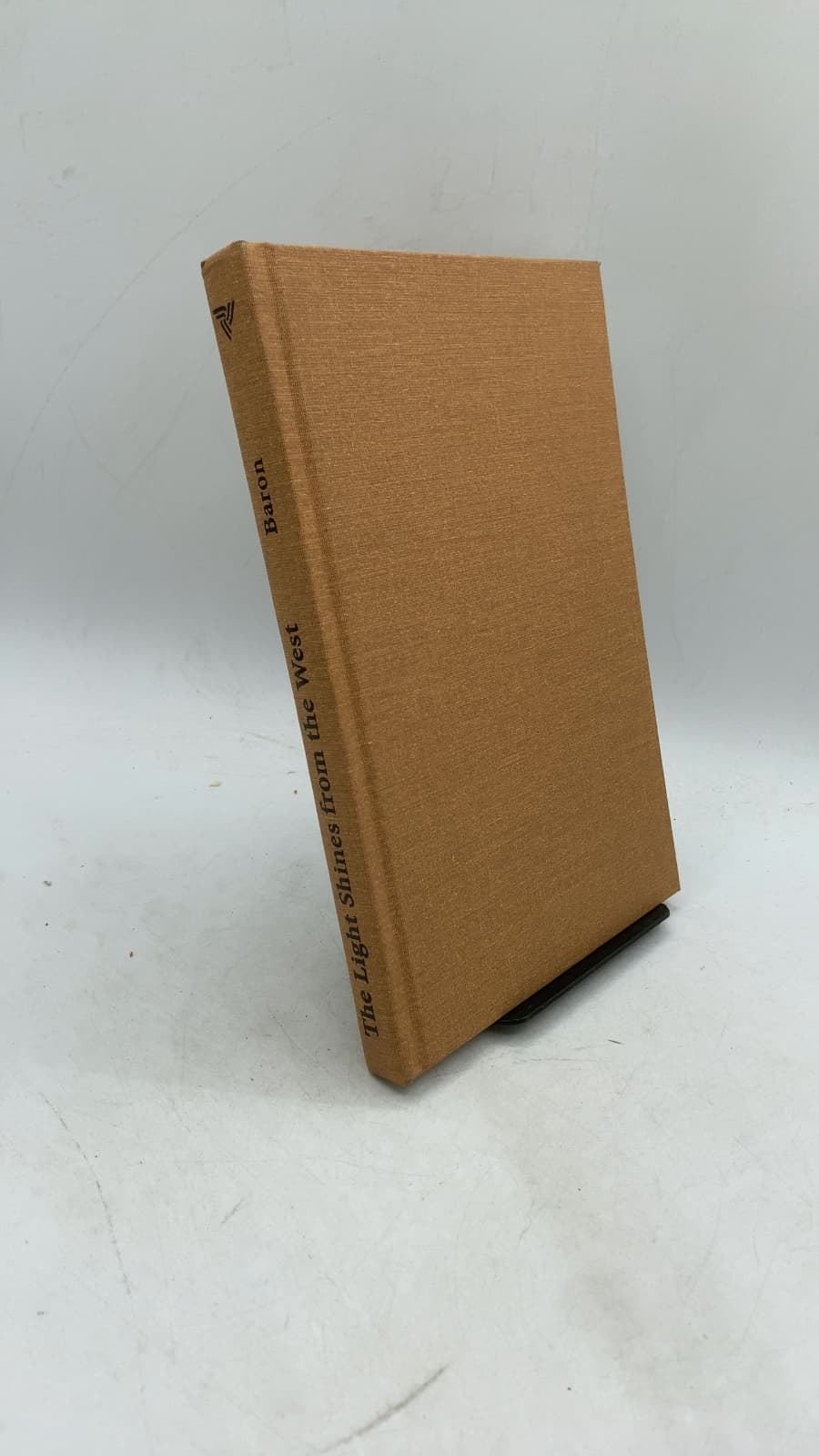 The Light Shines from the West by Robert C. Baron - front cover