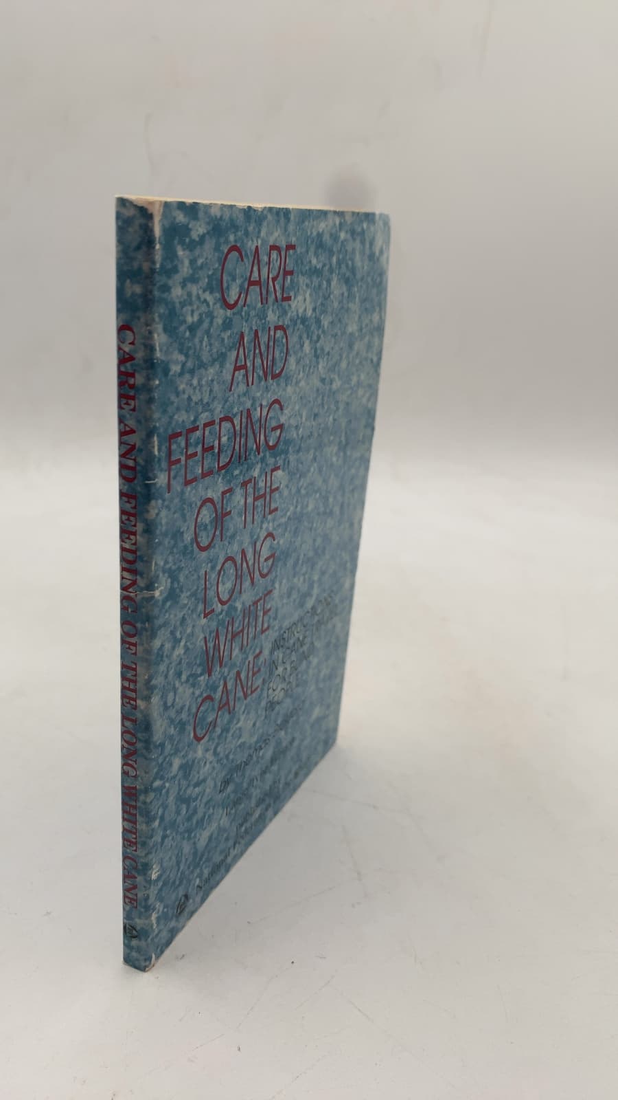Care and Feeding of the Long White Cane: Instructions in Cane Travel for Blind People by Thomas Bickford - front cover